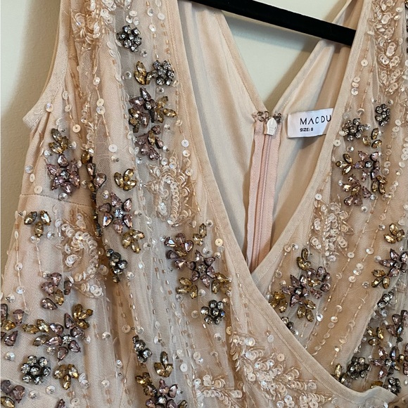 Mac Duggal 93575 Cap
Sleeve Embellished Gown
See NOTES - Picture 3 of 11